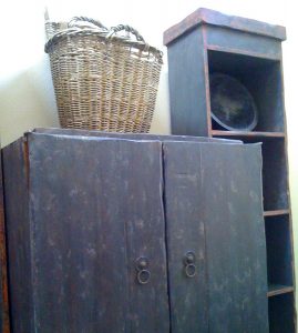 Beth Ayer Design uses vintage grape basket with repurposed cabinet for LA Loft